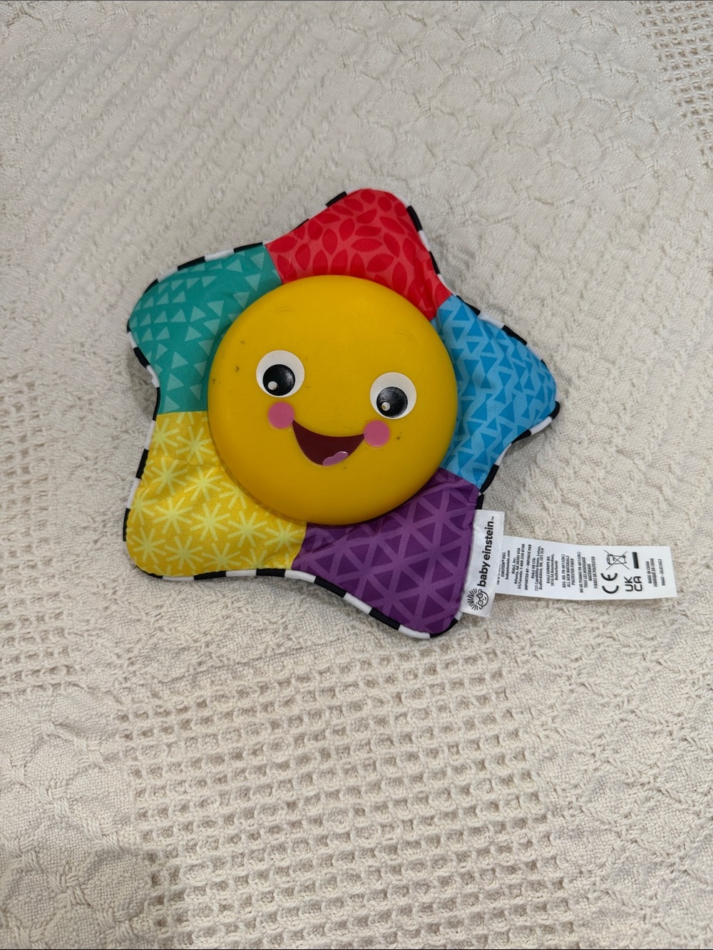 Baby Einstein toy with Velcro strap